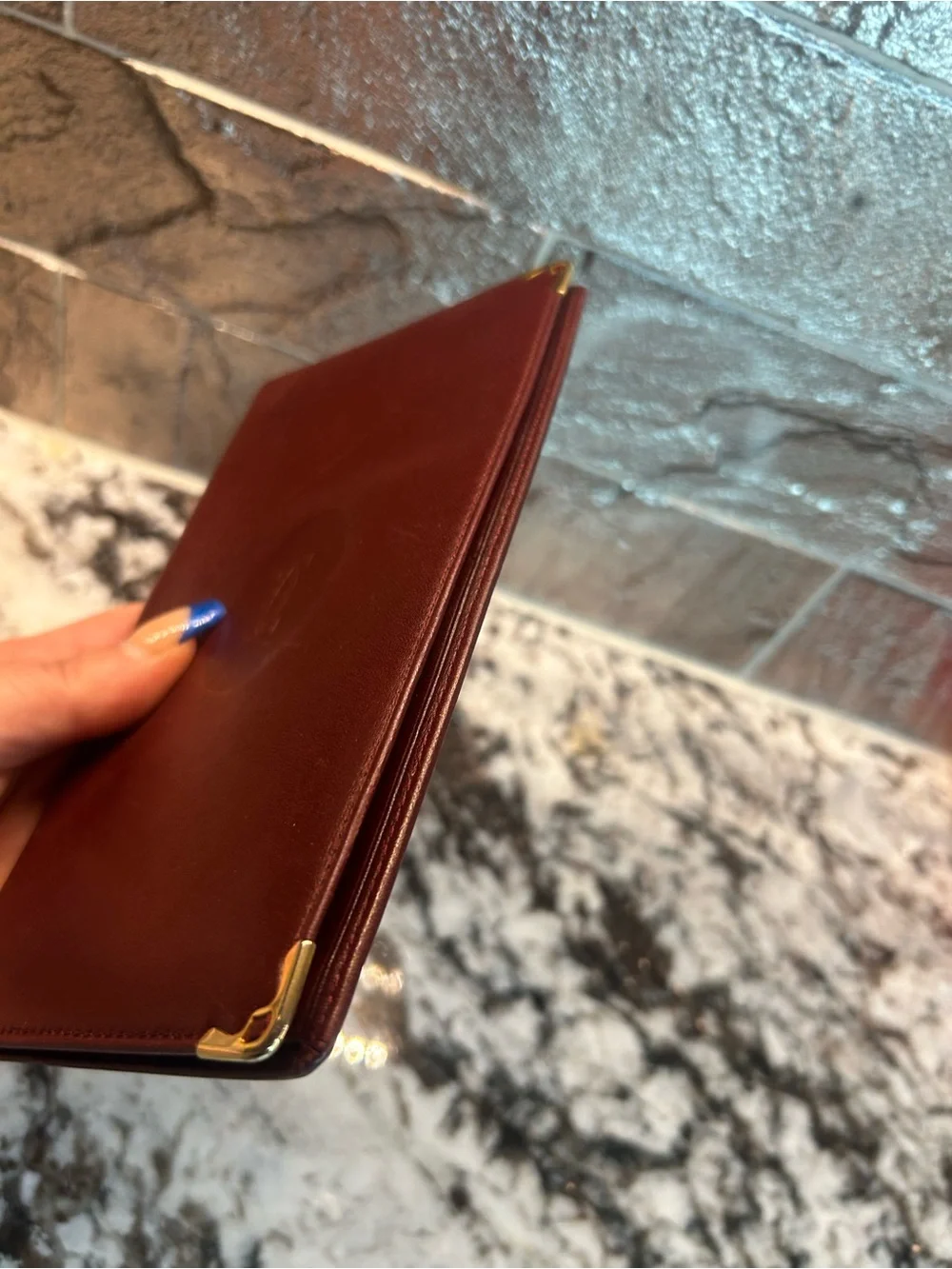 Cartier Burgundy Leather Money Clip with Gold Corner Accents